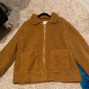 Brown fluffy coat in great condition with silk inside